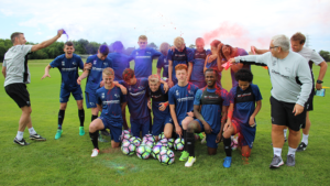 Derby County Schloars get colour shower by coaches