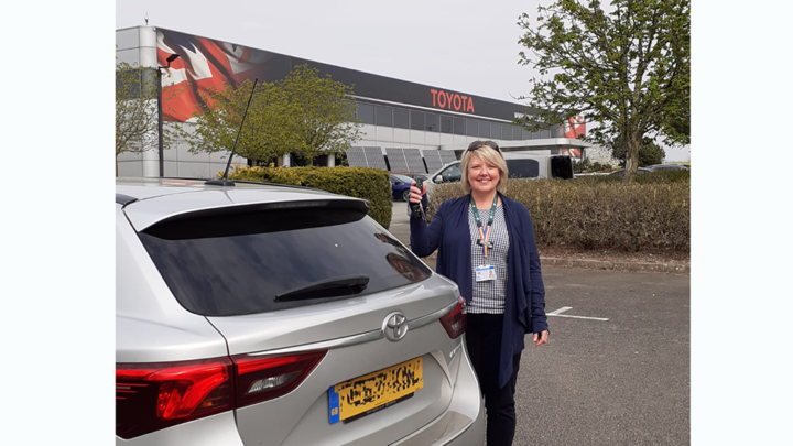 Hospice at Home manager with Toyota car