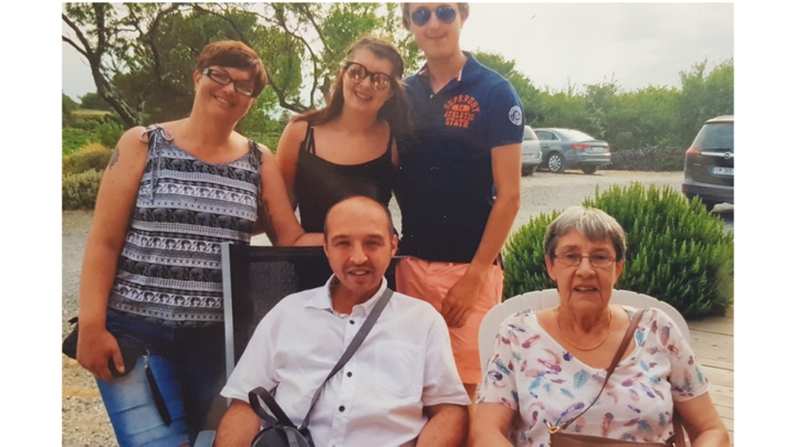Happy family in group shot on holiday