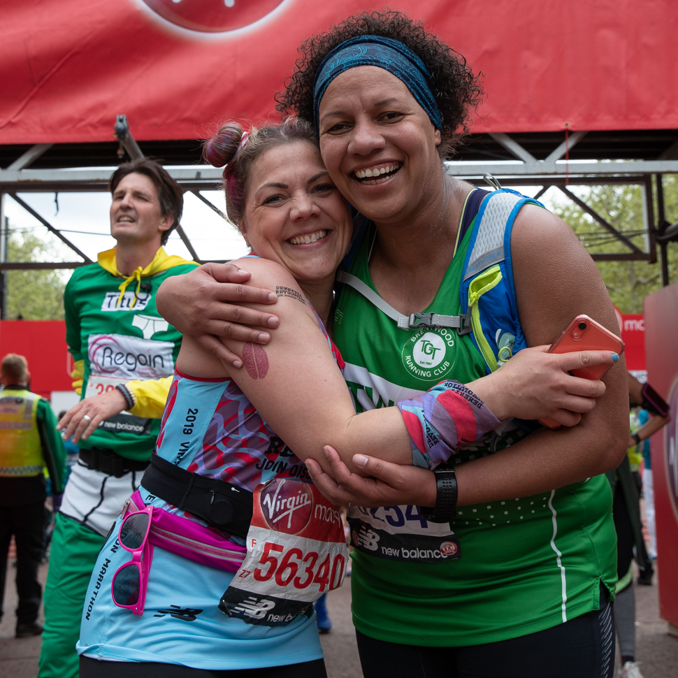 Smiling runners at finish line