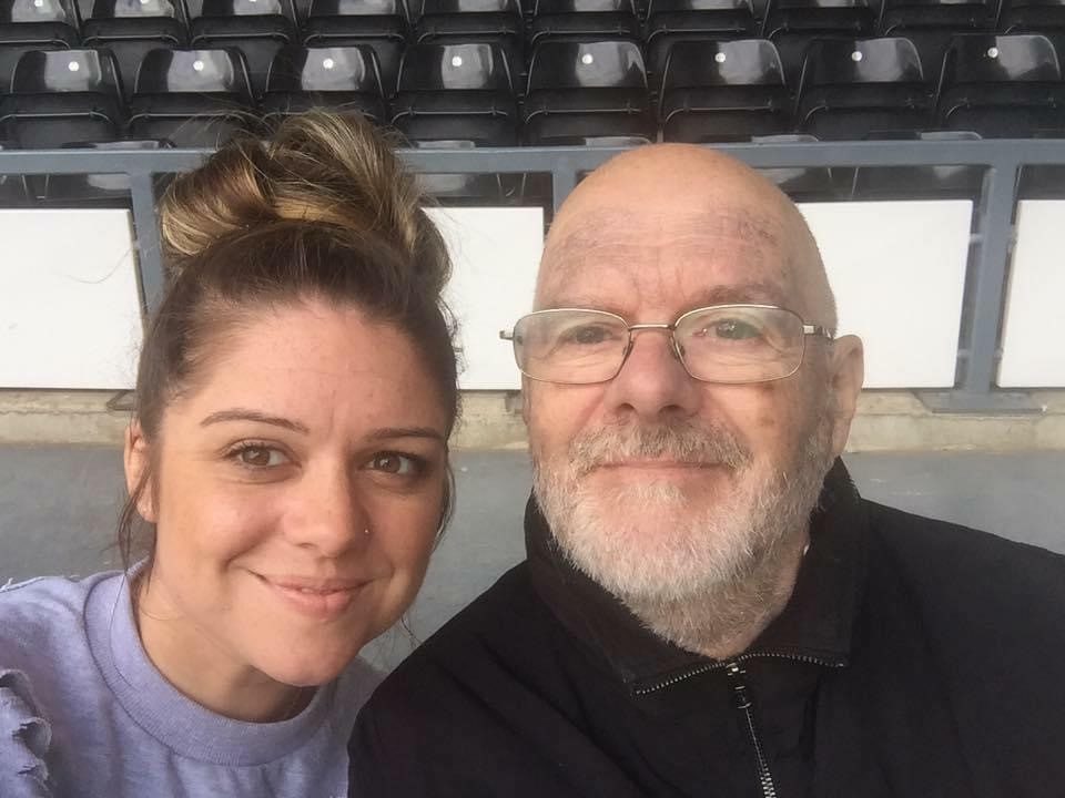 Man and daughter smiling in selfie