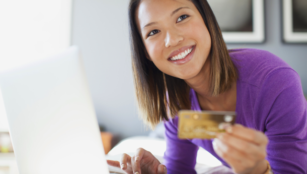 lady holding a credit card