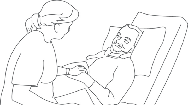 Line drawing of person talking to patient in bed