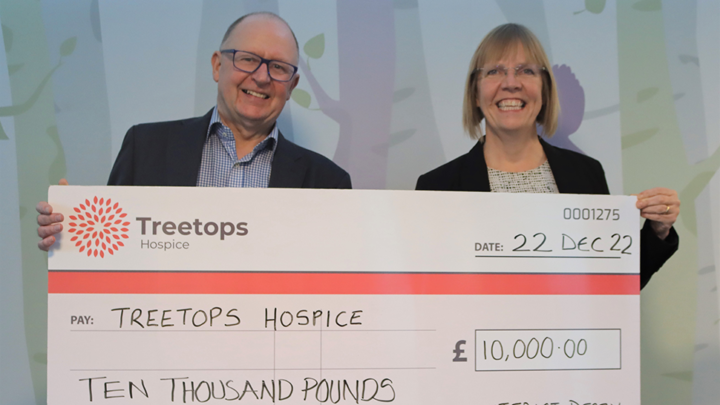 Interact Derby Branch Chair presents cheque to Treetops Hospice