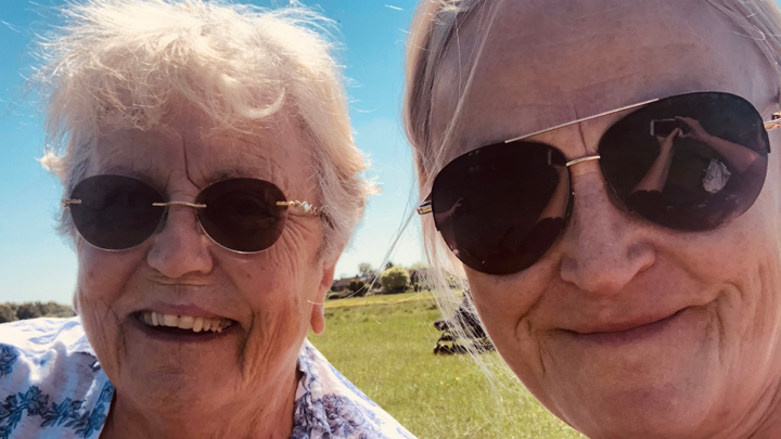 Mother and daughter smiling in selfie photo