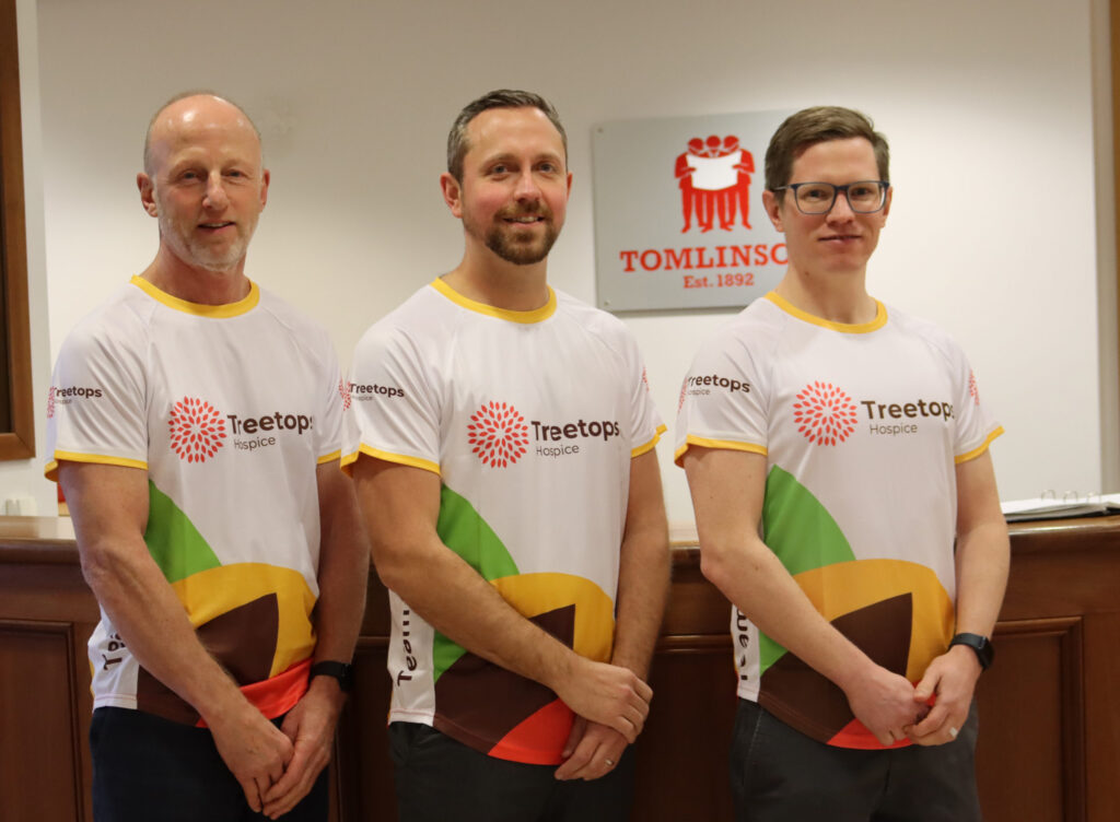Three men from G F Tomlinson in Treetops running t-shirts