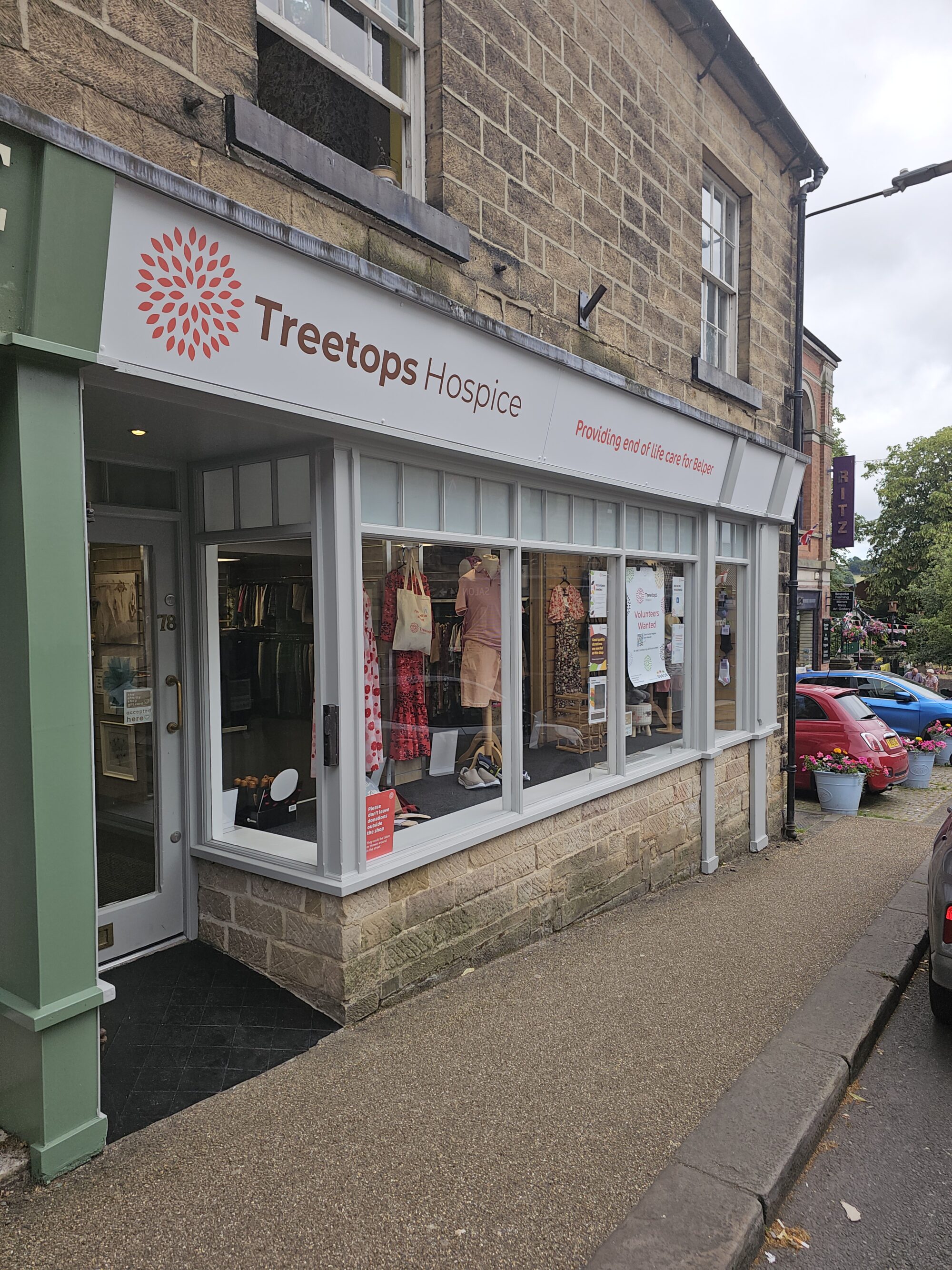 This is an image of the front of the Belper Treetops Hospice charity shop